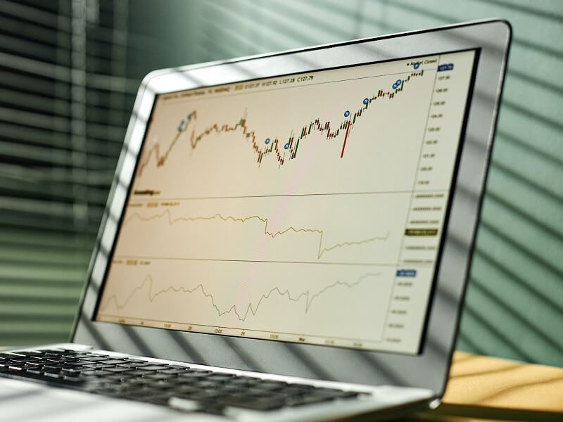 Laptop with investment data on screen Laptop with investment data on screen